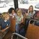 Kids on a bus (Pixland/Thinkstock)